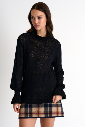 Haut élégant à col roulé en laine