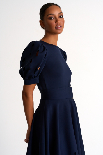 Top with balloon sleeves and oval cutouts