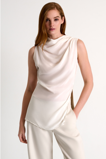 Draped high boat neckline sleeveless blouse