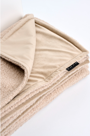 Reversible beige woolen throw